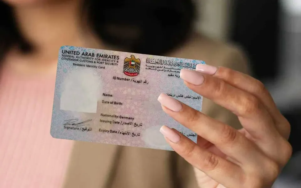 UAE Emirates ID card held in a hand